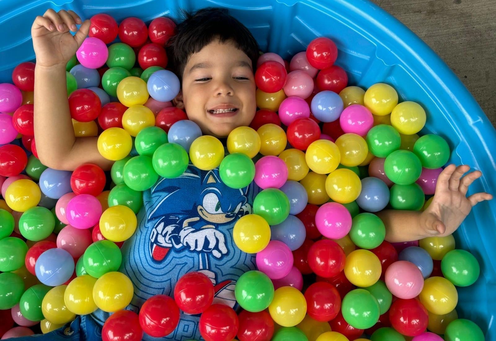 Toddler Playing with Ocean Balls